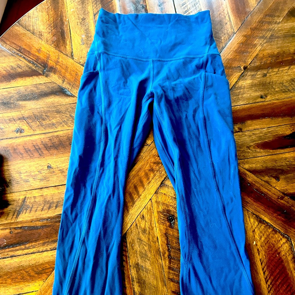 Size 0 Lululemon align, turquoise like new without tag. Length is 25.
